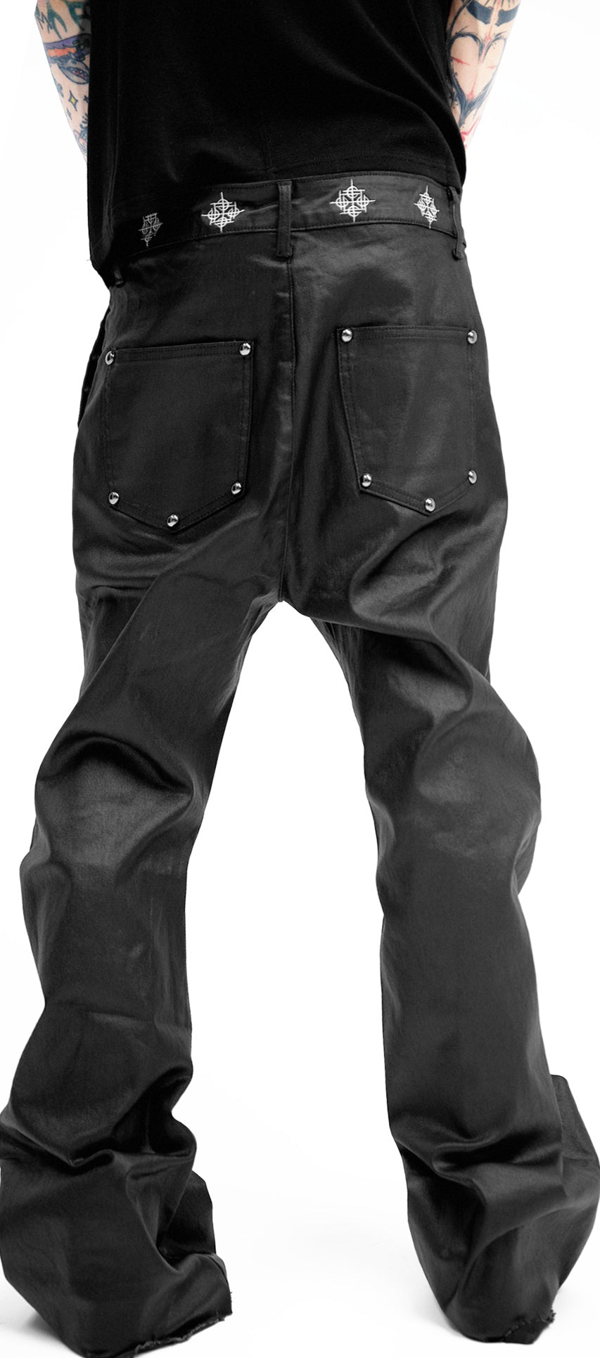 WAX COATED SLIM JEANS