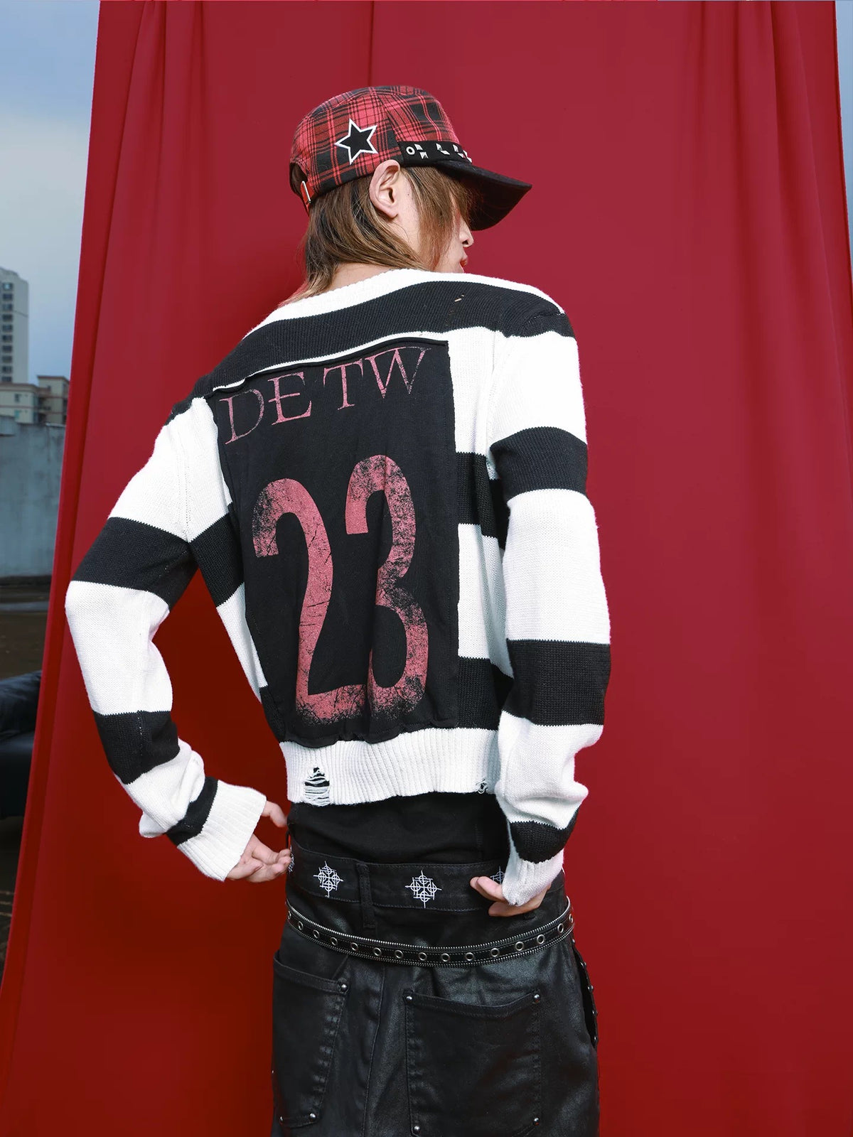 PATCHED STRIPE KNIT SWEATER