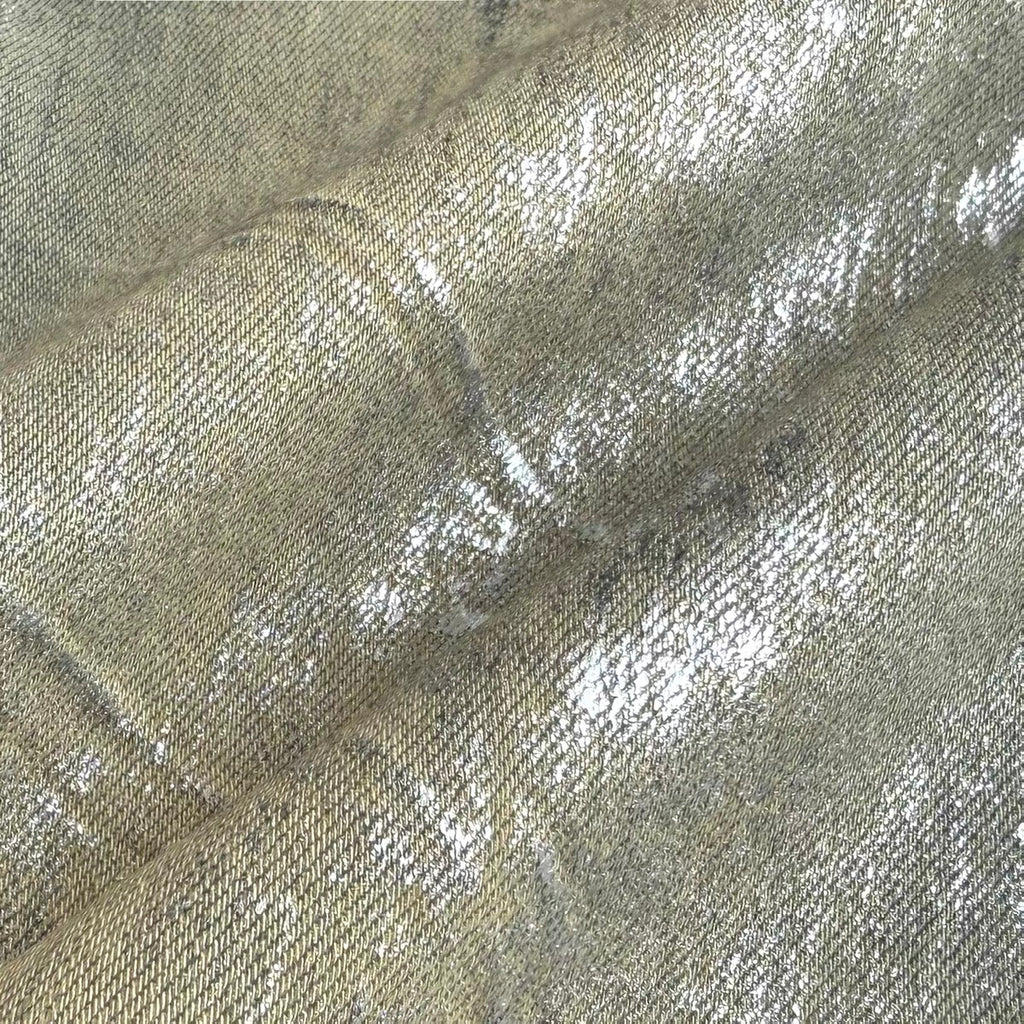 METALLIC COATED STACKED JEANS