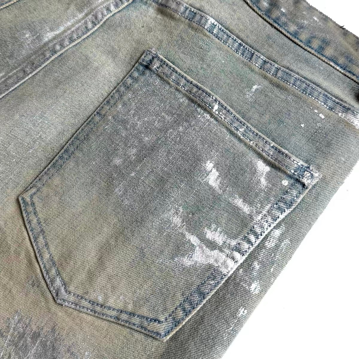 METALLIC COATED STACKED JEANS