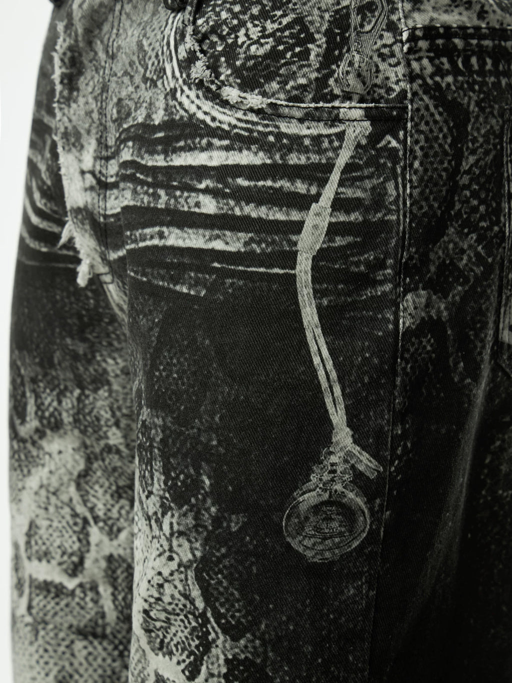 SNAKE PRINT RIPPED DENIM PANTS