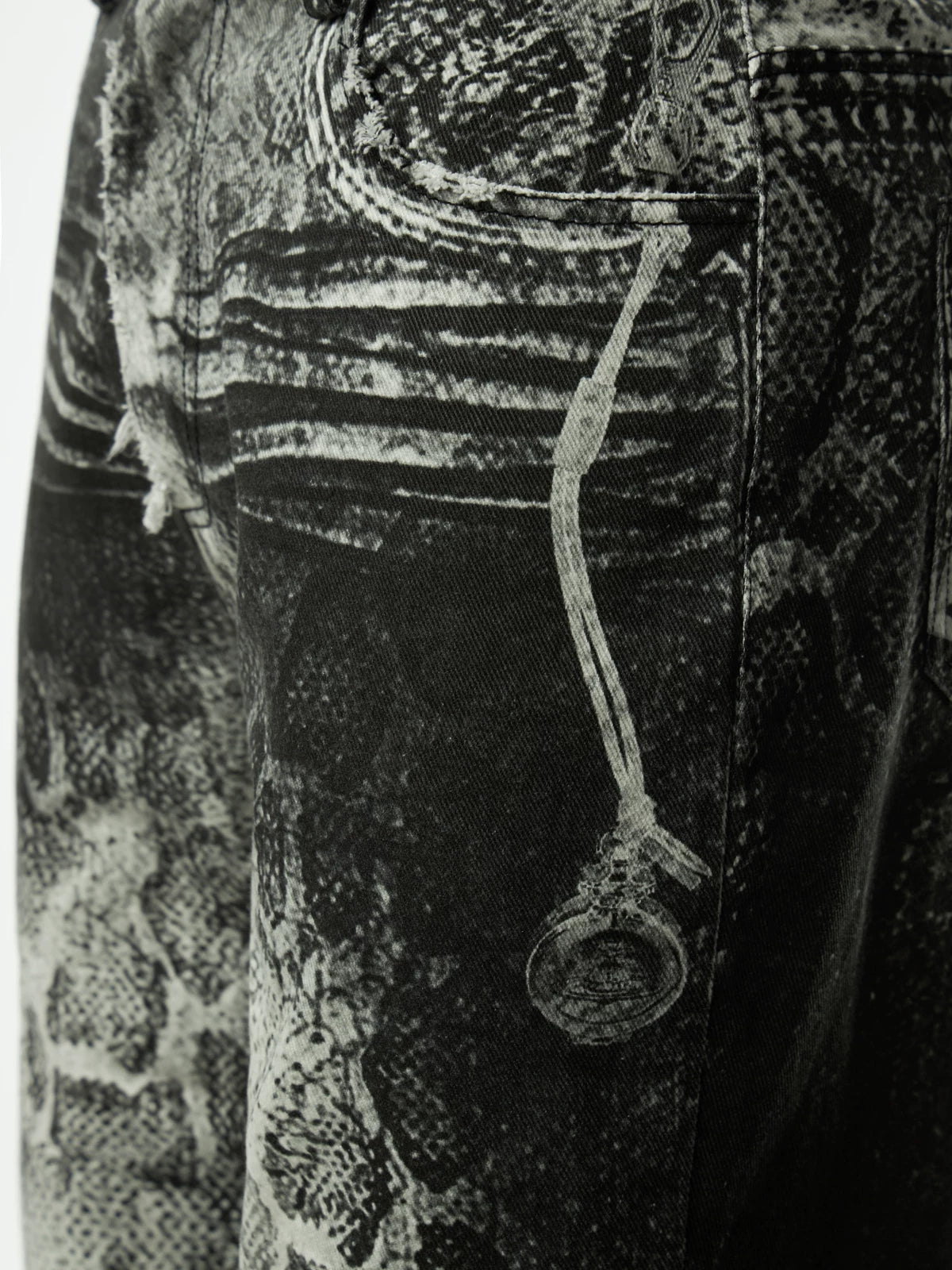 SNAKE PRINT RIPPED DENIM PANTS
