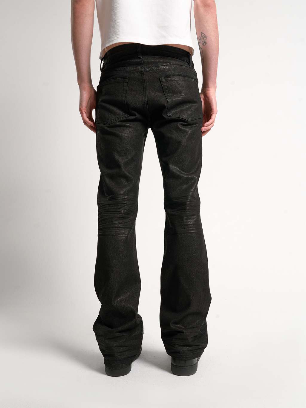 DISTRESSED WAXED JEANS