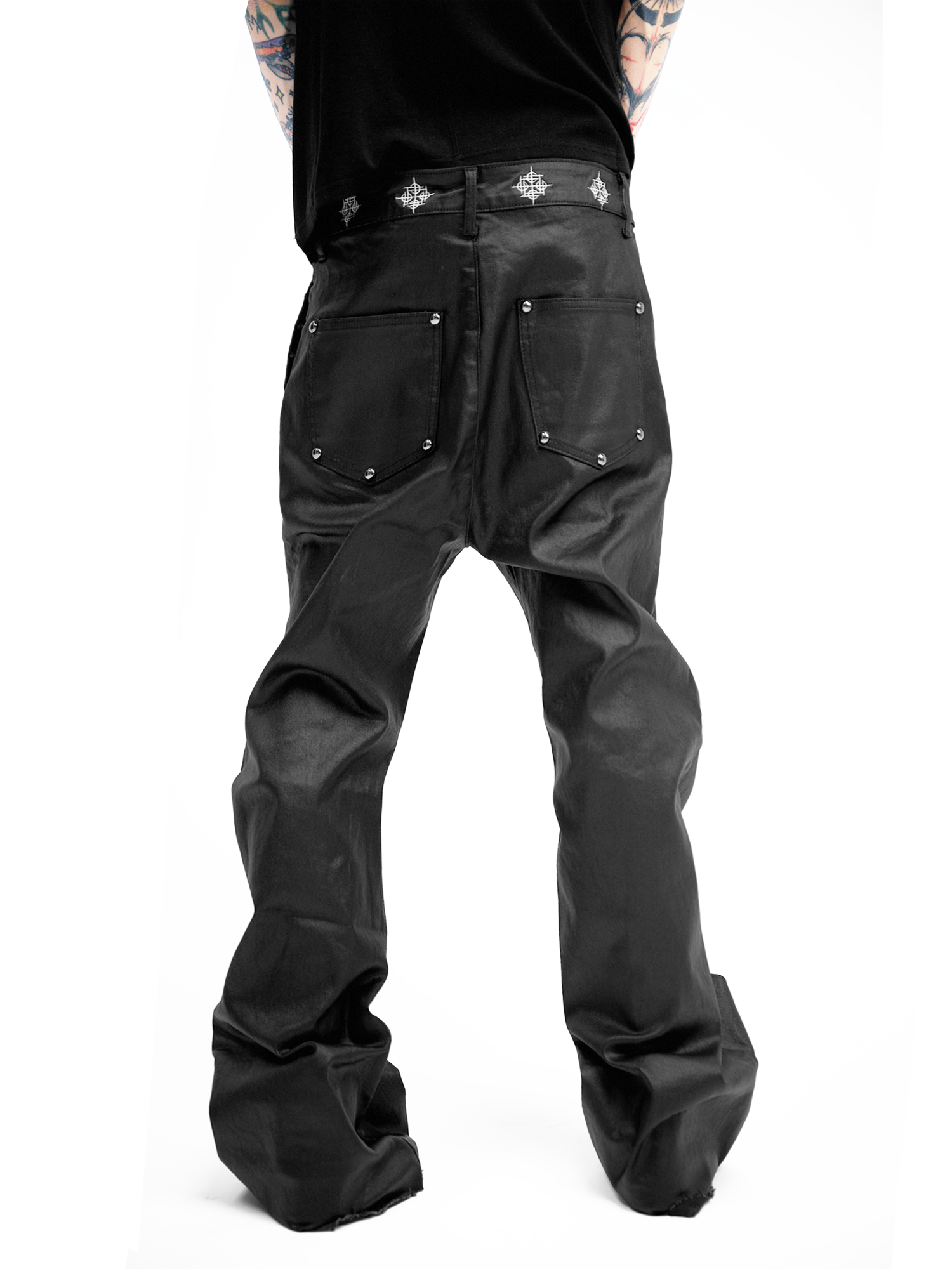 WAX COATED SLIM JEANS