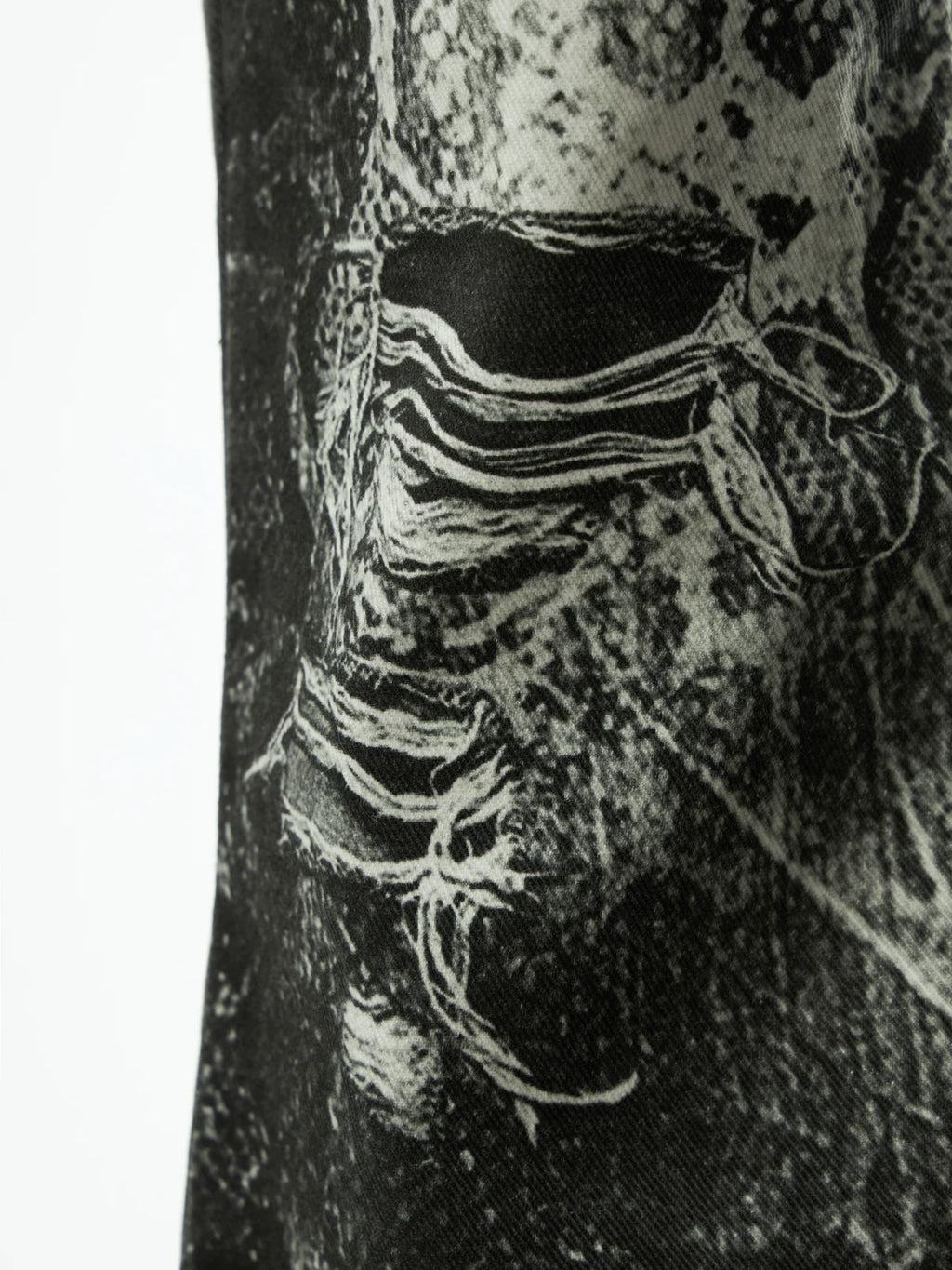 SNAKE PRINT RIPPED DENIM PANTS