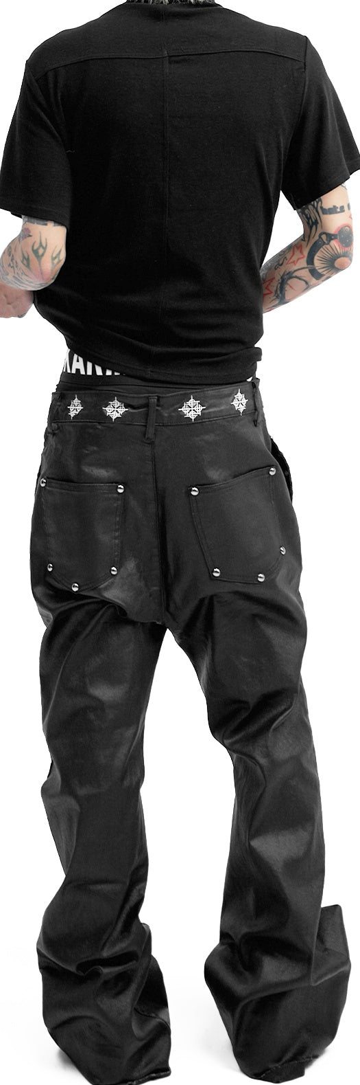 WAX COATED SLIM JEANS