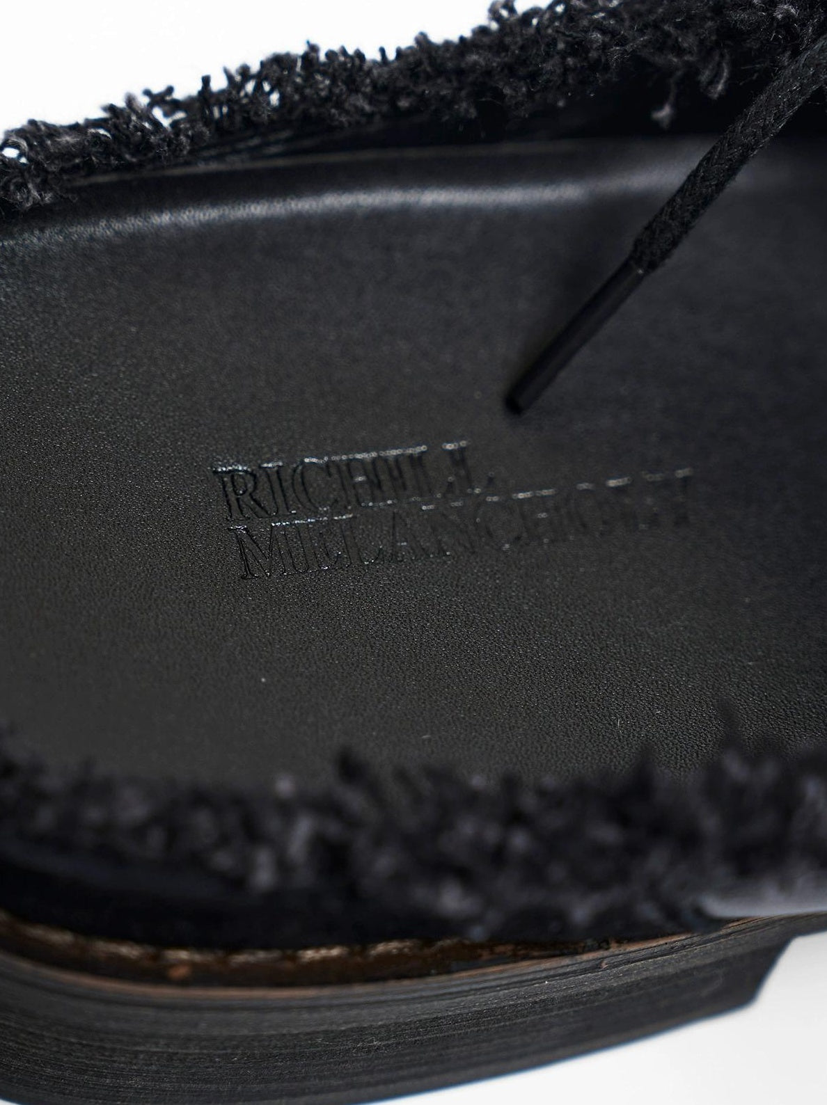 SCULPTED LEATHER HALF SLIP-ONS